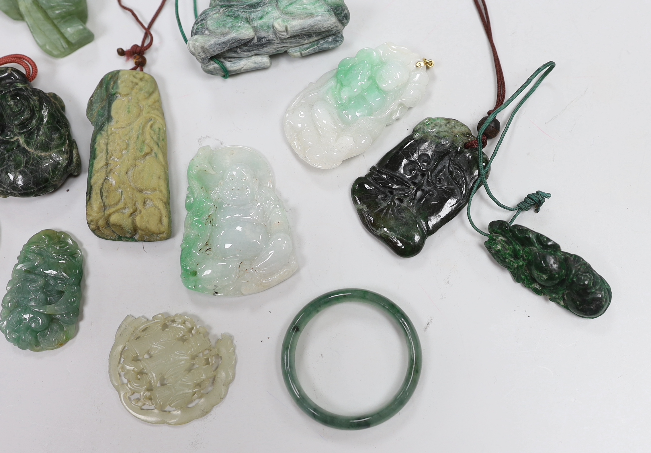 Thirteen Chinese jadeite and jade carvings, longest 6.4cm